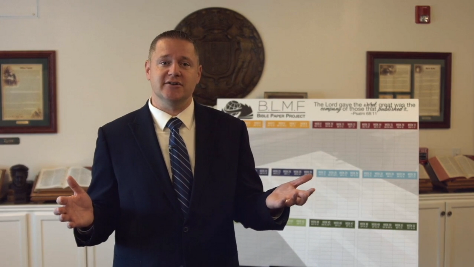 Still image of Pastor making a presentation